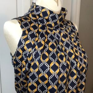 Beautiful high neck sleeveless blouse!